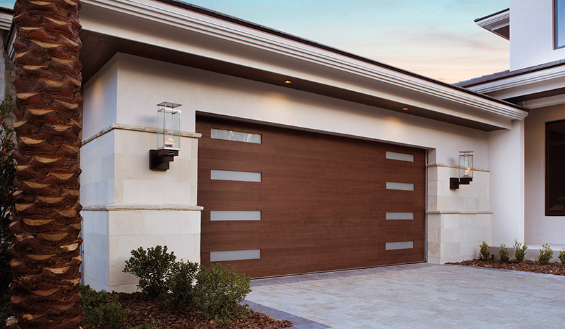 Four Reasons To Buy A New Garage Door